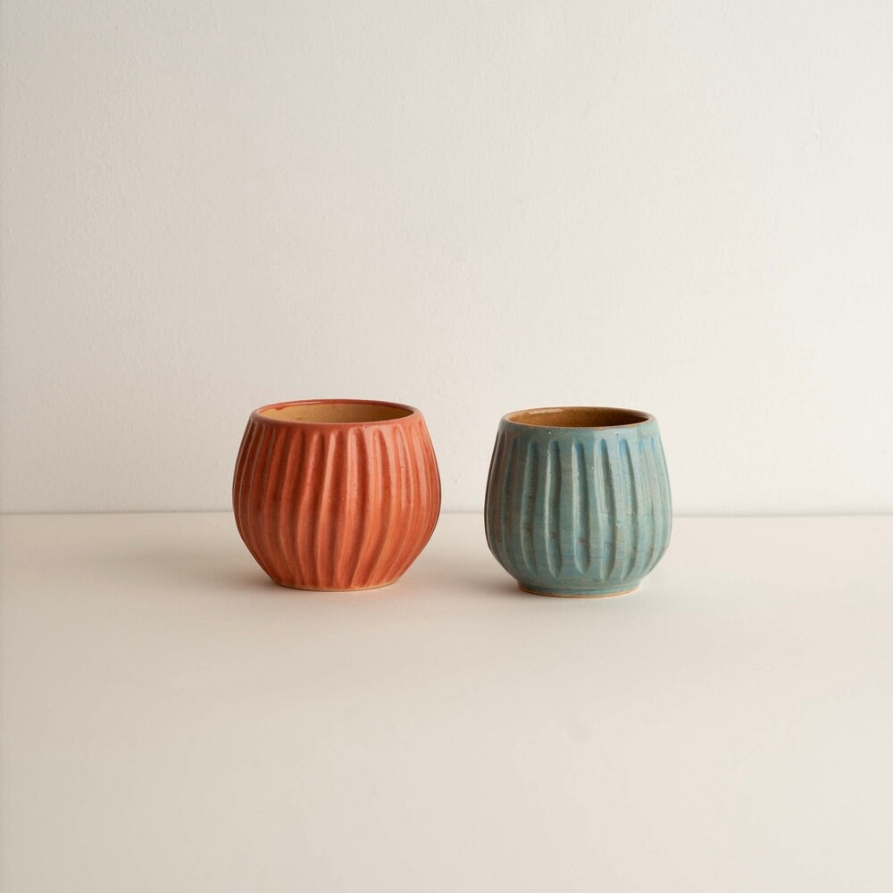Linear engraved cup