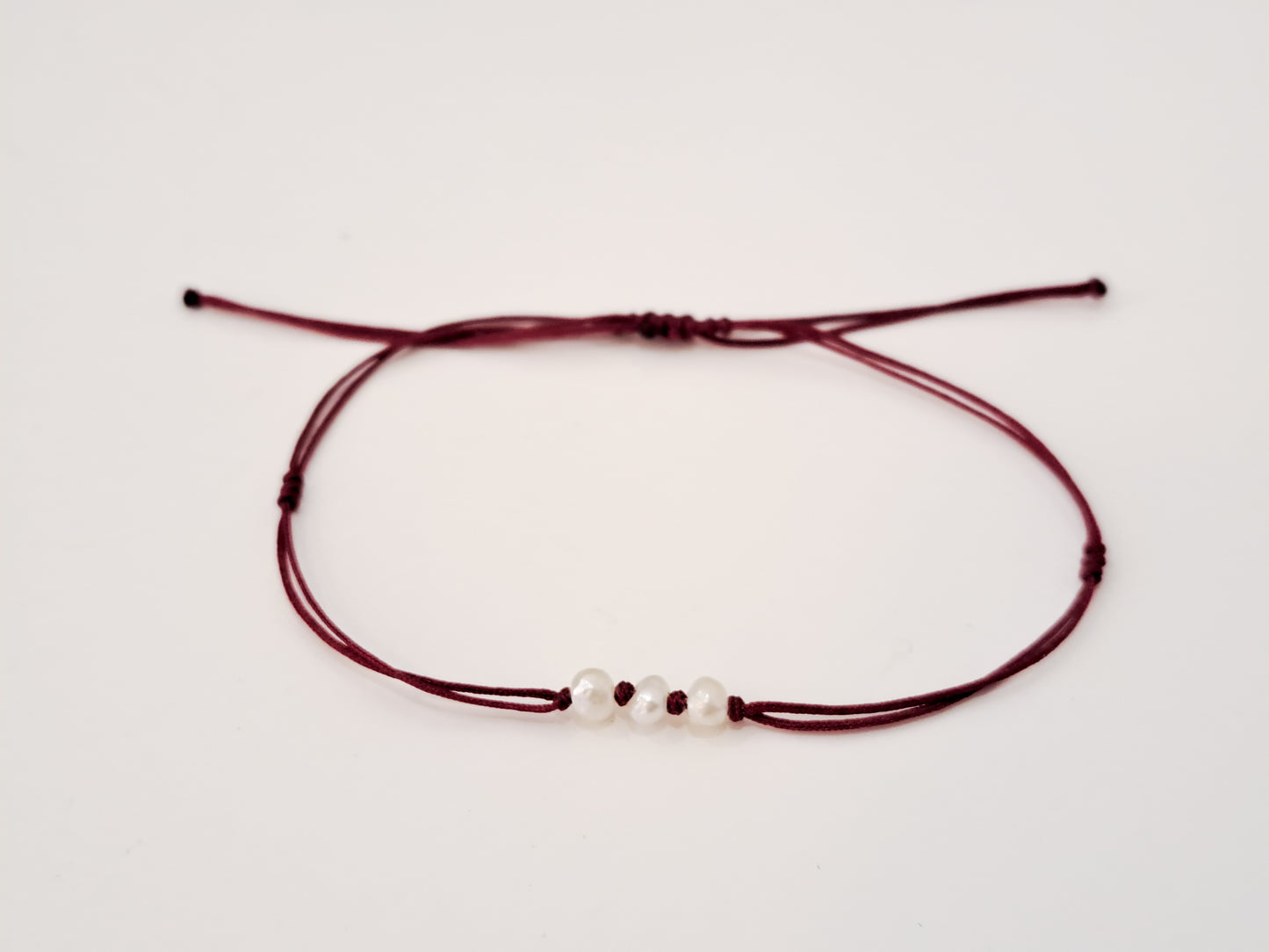 TinyOm Jewellery -  Pearls on Thread Bracelet