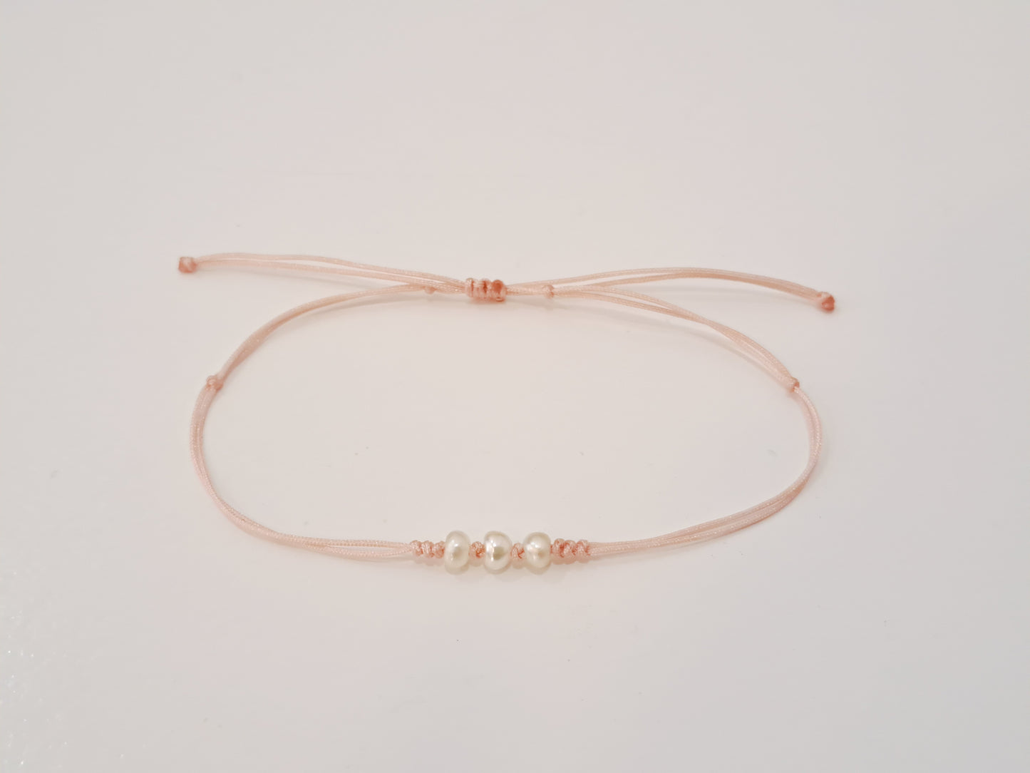 TinyOm Jewellery -  Pearls on Thread Bracelet