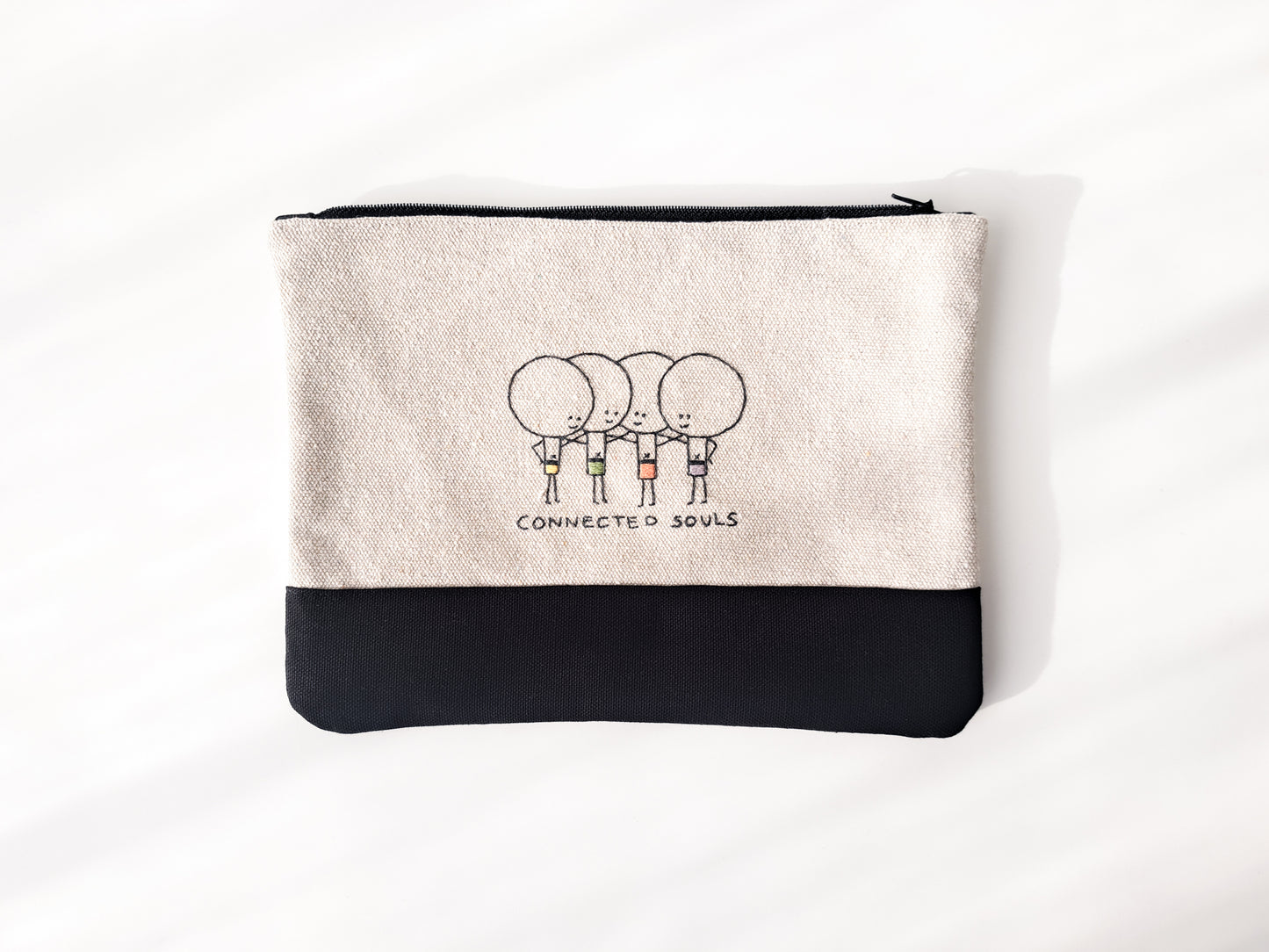 TinyOm Embroidered Pouches