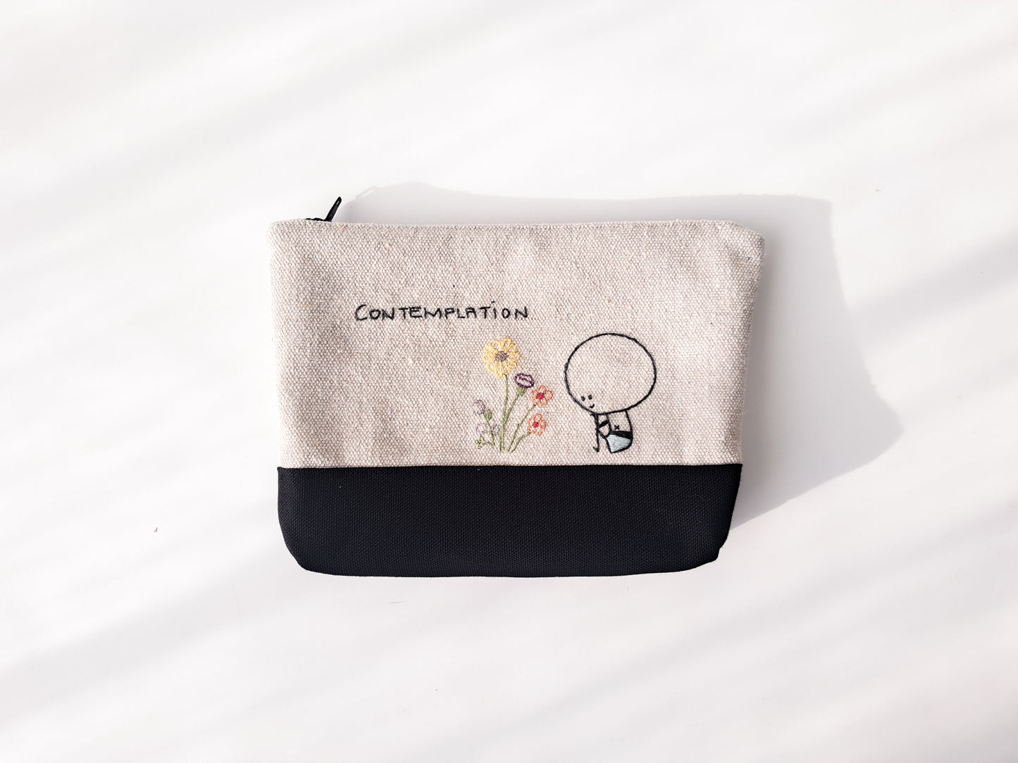 TinyOm Embroidered Pouches